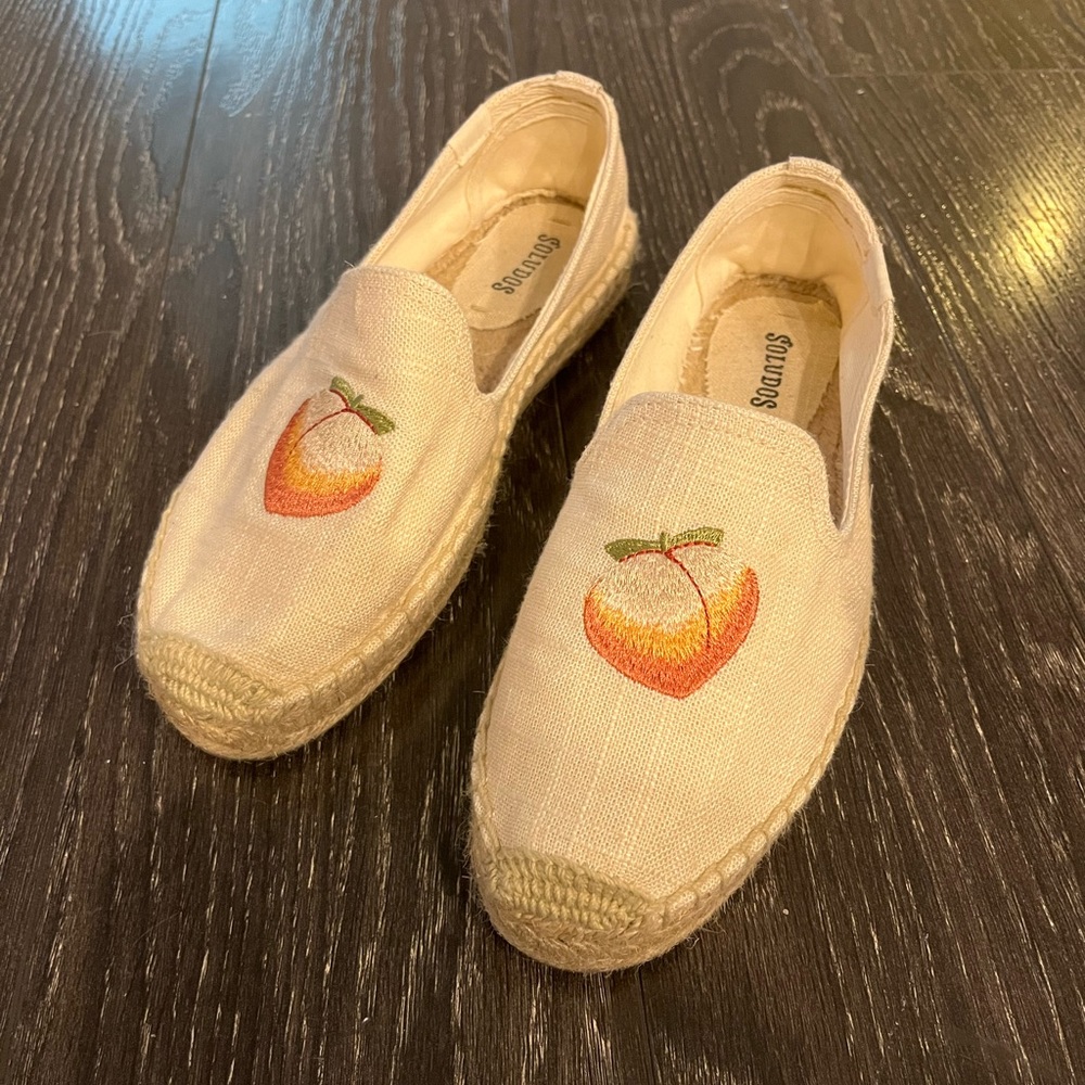 Espadrilles with peach embroidery from Soludos